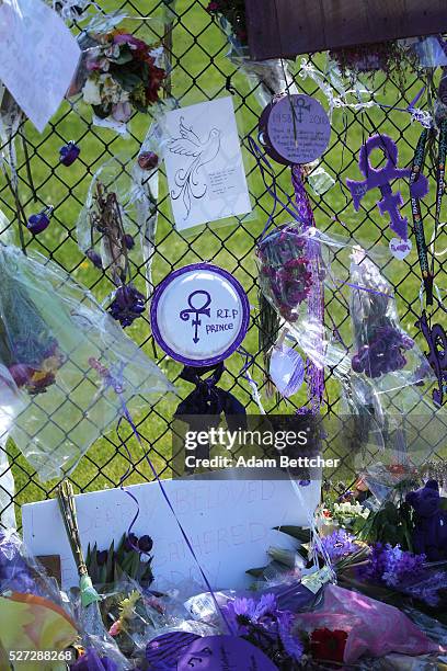 Tributes and memorials dedicated to Prince on the fence that surrounds Paisley Park on May 2, 2016 in Chaska, Minnesota. Prince died on April 21,...