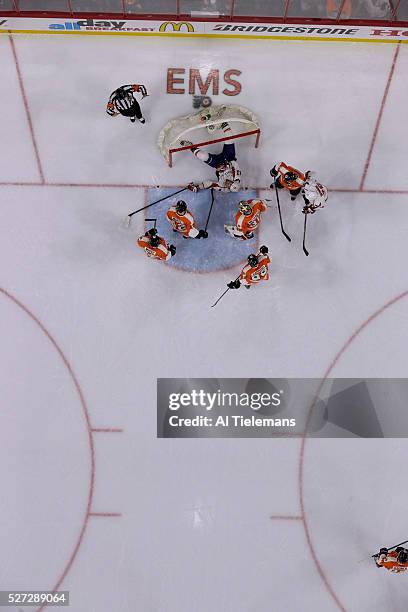 Aerial view of Philadelphia Flyers goalie Michael Neuvirth , Michael Raffl , Brandon Manning and Ryan White with Washington Capitals Tom Wilson...