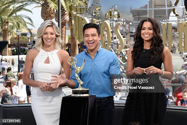 Charissa Thompson, Mario Lopez and Tracey Edmonds celebrate with their Day Time Emmy at "Extra" at Universal Studios Hollywood on May 2, 2016 in...