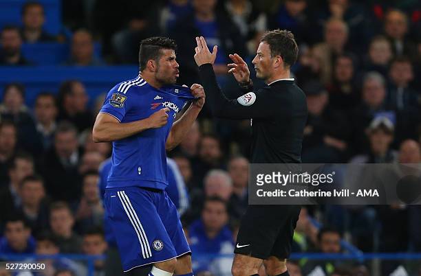 Diego Costa of Chelsea appeals to referee Mark Clattenburg after having his shirt pulled during the Barclays Premier League match between Chelsea and...