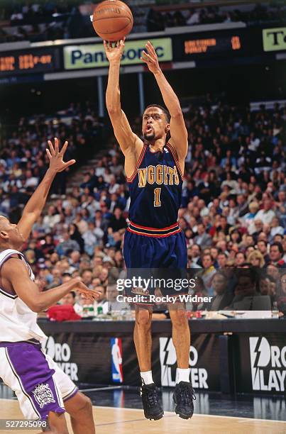 Mahmoud Abdul Rauf of the Denver Nuggets shoots against the Sacramento Kings circa 1996 at Arco Arena in Sacramento, California. NOTE TO USER: User...