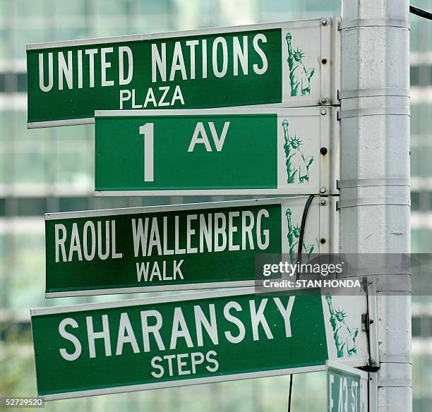 New York City street signs near Dag Hammarskjold Plaza across First Avenue from United Nations headquarters, 14 April in New York. The signs honor...
