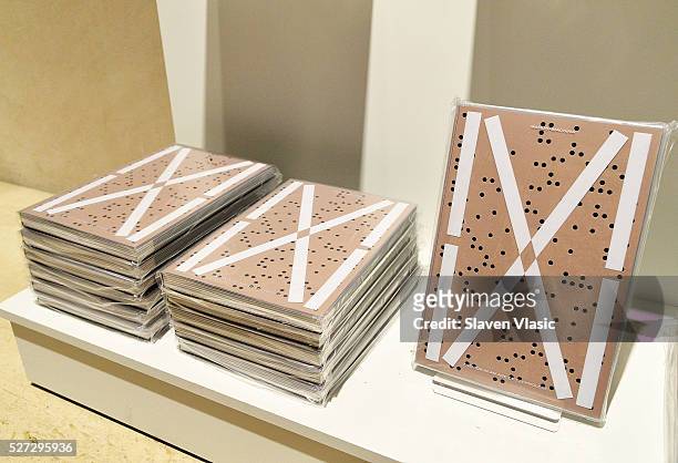 Copy of the exibition's catalog "Manus x Machina: Fashion in an Age of Technology" on display at the "Manus x Machina: Fashion in an Age of...