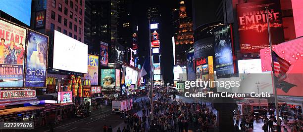 Panoramic view of Time Square, New York at night time. Times Square is the major commercial intersection in Midtown Manhattan, New York City, at the...