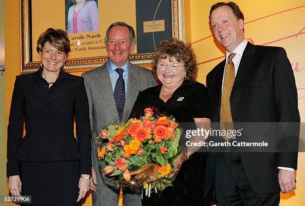 To R Cecile Bonnetond, Michael Beurk, Carole Nash and John West are pictured together after Carole was presented with flowers after making it through...