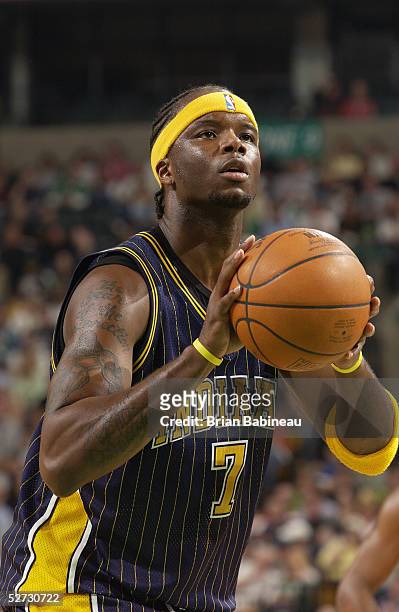Jermaine O'Neal of the Indiana Pacers shoots a free throw against the Boston Celtics in Game one of the Eastern Conference Quarterfinals during the...