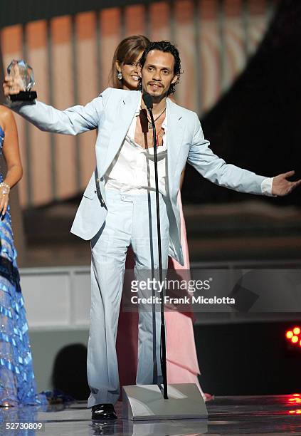 Singer Marc Anthony accepts the "Telemundo Star Award" onstage at the 2005 Billboard Latin Music Awards at the Miami Arena April 28, 2005 in Miami,...