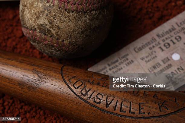 An antique vintage baseball, baseball bat, and used ticket stub. 7th June 2012. Photo Tim Clayton