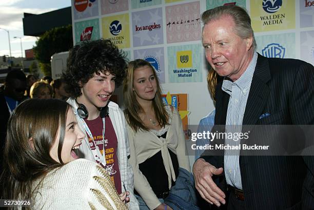 Actress Alexa Nikolas, and actors Sean Flynn and Jon Voight arrive at the Los Angeles premiere of Warner Brothers "Duma" at the Cinerama Dome at...