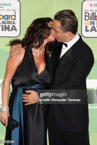 Singer Cristian Castro poses with his wife Valeria Liberman backstage at 2005 Billboard Latin Music Awards at the Miami Arena April 28, 2005 in...