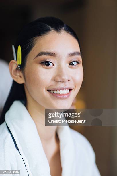 Chinese model Ming Xi prepares before the 2016 "Manus x Machina" Met Gala at the Mark Hotel on May 02, 2016 in New York, New York. Manicure by Sheril...