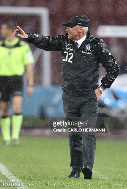 Atalanta's Italian coach Edoardo Reja gestures during the Italian Serie A football match between SSC Napoli and Atalanta BC at San Paolo stadium in...