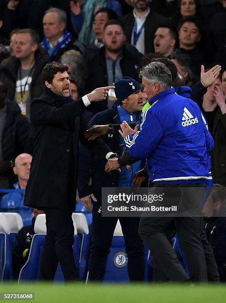 Mauricio Pochettino the manager of Tottenham Hotspur and Guus Hiddink the interim manager of Chelsea clash during the Barclays Premier League match...