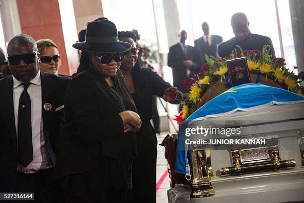 Children of rumba musician Papa Wemba pay their respects during their father's funeral in Kinshasa on May 2, 2016. Democratic Republic of Congo's...