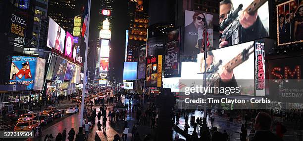 View of Times Square Manhattan, showing an advert for the new Cold War drama series The Americans. Times Square, New York, USA. 16th January 2013....