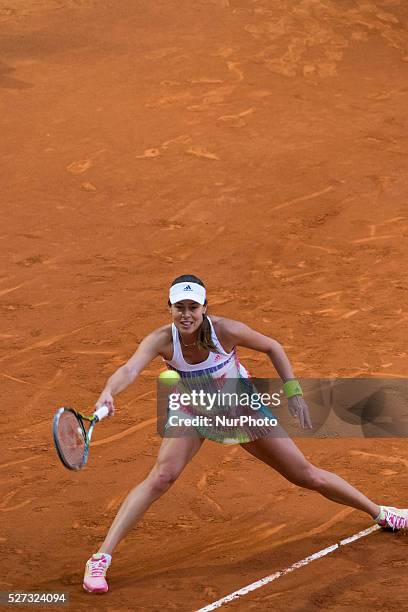 Ana Ivanovic of Serbia in action against Louisa Chirico during match of day three of the Mutua Madrid Open tennis tournament at the Caja Magica on...