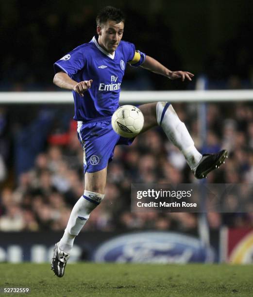 John Terry of Chelsea controls the ball during the Champions League Semi-Final match between Chelsea and Liverpool at Stamford Bridge on April 27,...