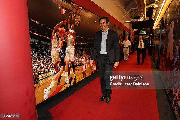 Head Coach Erik Spoelstra of the Miami Heat walks towards the locker room prior to Game Seven of the Eastern Conference Quarterfinals against the...