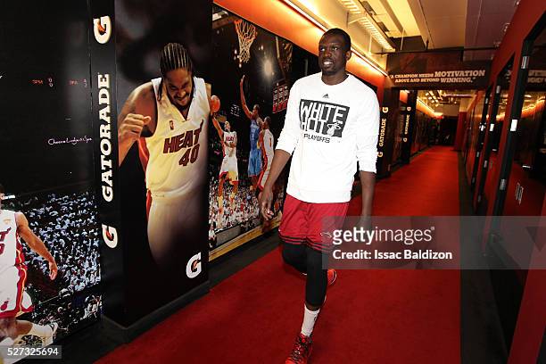 Luol Deng of the Miami Heat walks towards the locker room prior to Game Seven of the Eastern Conference Quarterfinals against the Charlotte Hornets...