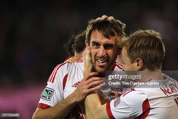 Eric Alexander, , New York Red Bulls, is congratulated by team mate Dax McCarty after scoring his sides fourth goal during the New York Red Bulls V...