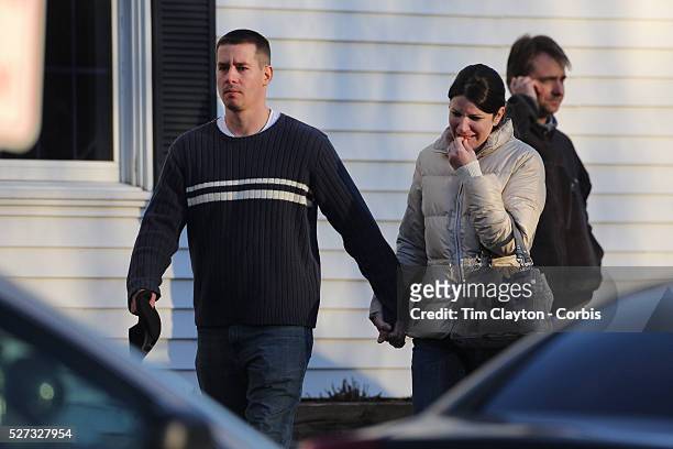 Unidentified people, believed to be parents and relatives, leaving the fire station in Sandy hook after today's shootings at Sandy Hook Elementary...