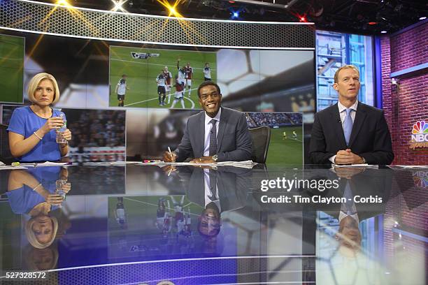 Sports Network presenters Rebecca Lowe, Robbie Earle, and Robbie Mustoe, , watching the live matches in the NBC Sports Network studios in Stamford,...
