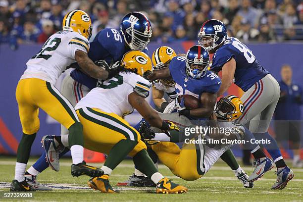 Andre Brown, the New York Giants running back in action during the New York Giants Vs Green Bay Packers, NFL American Football match at MetLife...