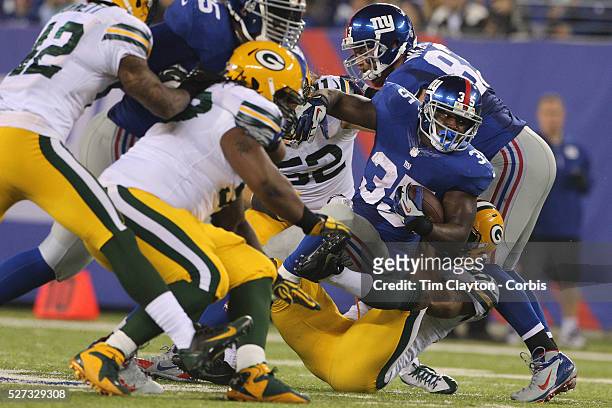 Giants running back Andre Brown makes a first down during the New York Giants Vs Green Bay Packers, NFL American Football match at MetLife Stadium,...