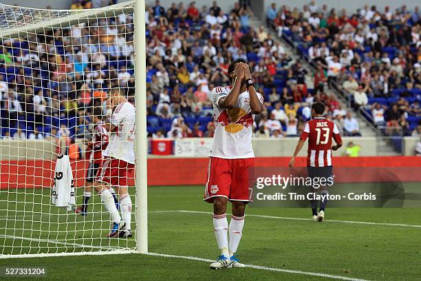 New York Red Bulls player Roy Miller holds his head in his hands after missing an easy chance during the New York Red Bulls V Chivas USA Major League...