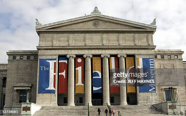 Visitors arrive at the Field Museum of Natural History in Chicago 27 April, 2005. Some of the museum's prized exhibits include: Sue, billed as the...