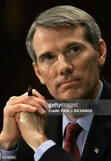 Robert J. Portman, listens to questions during his confirmation hearing in this 21 April 2005 file photo on Capitol Hill in Washington, DC. The...