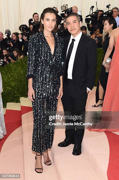 Alexa Chung and Thakoon Panichgul attend the "Manus x Machina: Fashion In An Age Of Technology" Costume Institute Gala at Metropolitan Museum of Art...