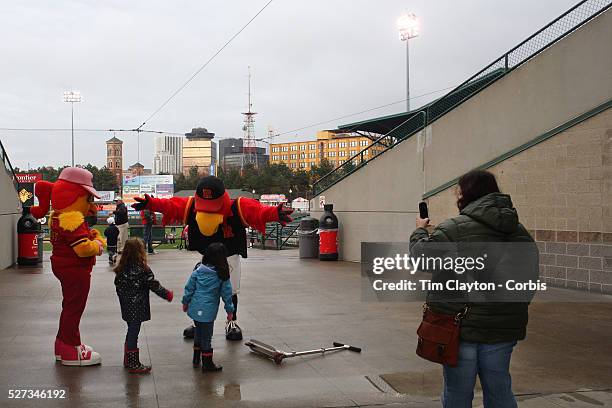 Mascots Mittsy and Spikes greet children during the Rochester Red Wings V The Scranton/Wilkes-Barre RailRiders, Minor League ball game at Frontier...