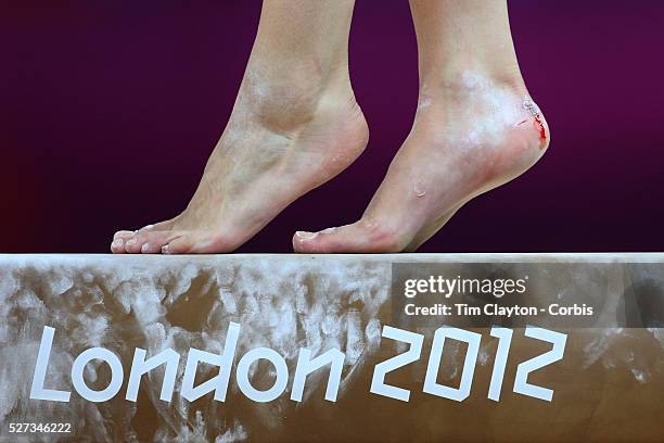 Study of gymnasts feet on the balance beam. One of the most challenging disciplines of the Olympic games sees young gymnasts performing amazing...