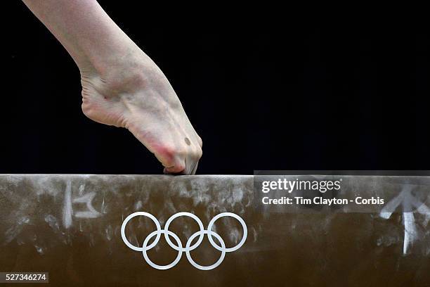 Study of gymnasts feet on the balance beam. One of the most challenging disciplines of the Olympic games sees young gymnasts performing amazing...