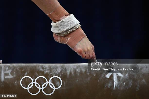 Study of gymnasts feet on the balance beam. One of the most challenging disciplines of the Olympic games sees young gymnasts performing amazing...