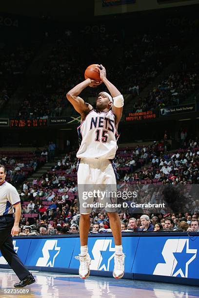 Vince Carter of the New Jersey Nets shoots against the New York Knicks during the game at Continental Airlines Arena on April 7, 2005 in East...