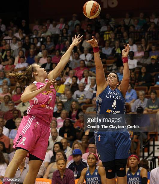 Janel McCarville, , Minnesota Lynx, shoots over Kayla Pedersen, Connecticut Sun, during the Connecticut Sun Vs Minnesota Lynx, WNBA regular season...