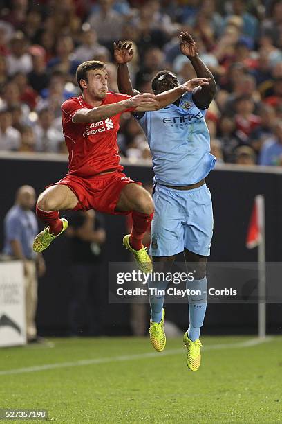 Jack Robinson, , Liverpool, challenges for a header with Micah Richards, Manchester City, during the Manchester City Vs Liverpool FC Guinness...