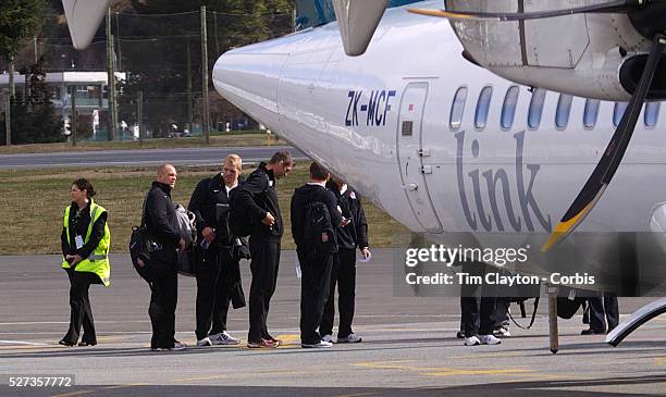 England Captain Mike Tindall with team mates boarding a plane in Queenstown as the England team depart for their match against Georgia in Dunedin...