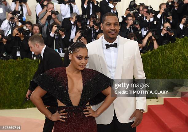 Camello And La La Anthony arrive for the Costume Institute Benefit at the Metropolitan Museum of Art on May 2, 2016 in New York. / AFP / TIMOTHY A....