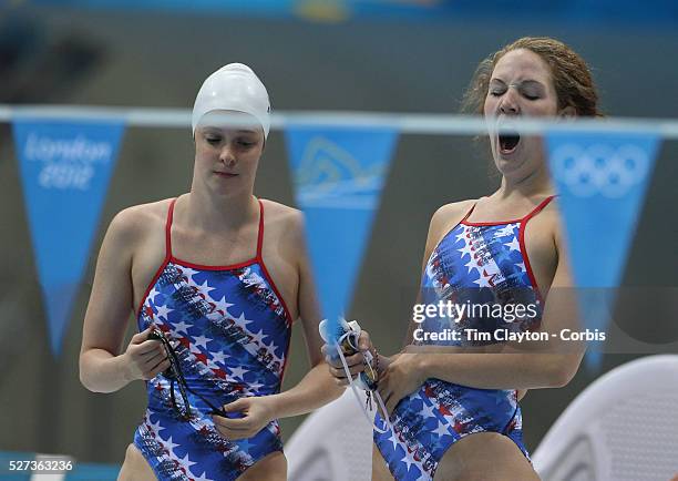 Swimmers Cammile Adams, and Shannon Vreeland find yawning is contagious before training at the Aquatic Centre at Olympic Park, Stratford during the...