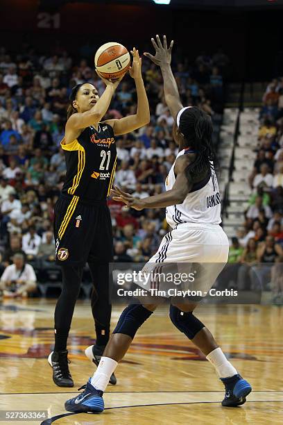 Jennifer Lacy, Tulsa Shock, shoots past Chiney Ogwumike, Connecticut Sun, during the Connecticut Sun Vs Tulsa Shock WNBA regular season game at...