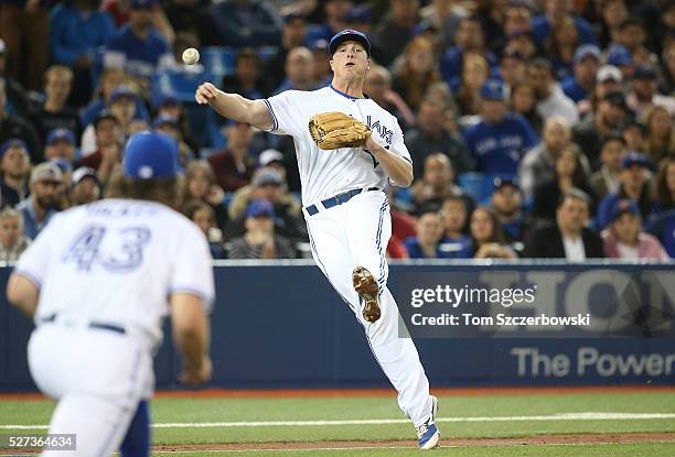 Matt Dominguez of the Toronto Blue Jays cannot throw out Austin Jackson of the Chicago White Sox who hits an infield single in the third inning...