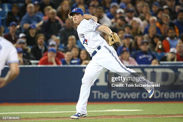 Matt Dominguez of the Toronto Blue Jays cannot throw out Austin Jackson of the Chicago White Sox who hits an infield single in the third inning...