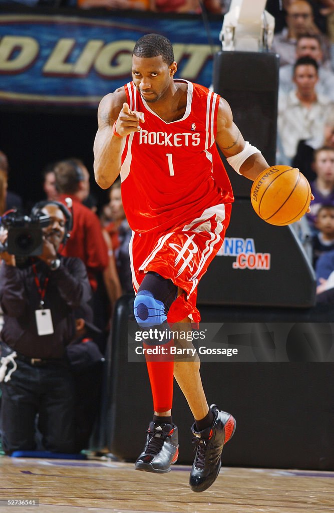 T Mac Rockets Tracy McGrady of the Houston Rockets dribbles upcourt during the game ...