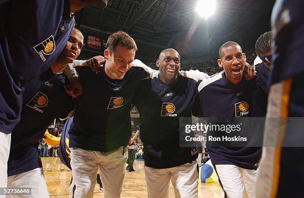 Indiana Pacers players get fired up before their game against the Miami Heat on March 31, 2005 at Conseco Fieldhouse in Indianapolis, Indiana. The...