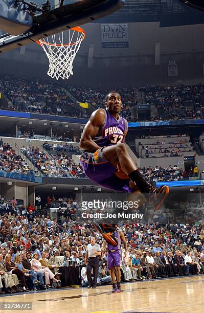 Amare Stoudemire of the Phoenix Suns brings the ball down to his waste before dunking the ball against the Memphis Grizzlies in Game three of the...