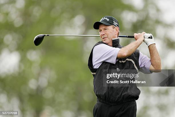 Larry Nelson hits a shot during the second round of the Liberty Mutual Legends of Golf at the Savannah Harbor Golf Resort on April 23, 2005 in...