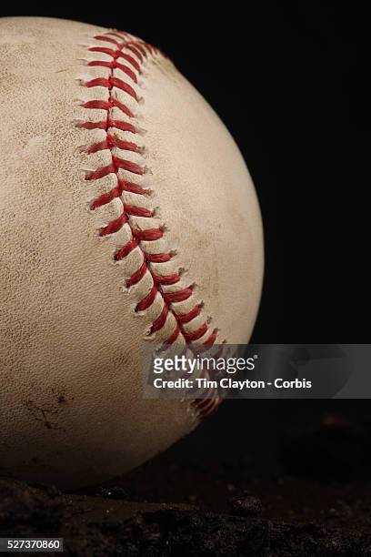 An authentic Rawlings used baseball from the 2012 Major League Baseball season showing the red stitching and markings. 16th May 2012. Photo Tim...